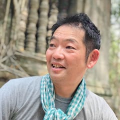 地域連携コーディネーター、漆原比呂志さんの写真